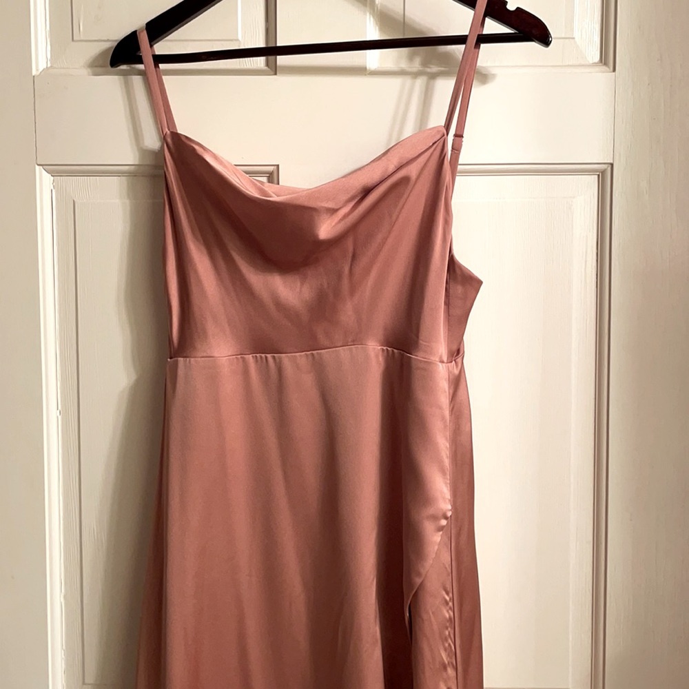 Beautiful backless dress by Fame & Partners. Gorgeous blush color for weddings.
